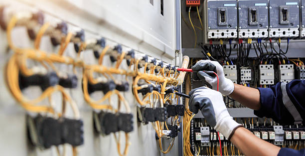 Professional Electrical Panel Upgrade technician working in Monroe County County, IA